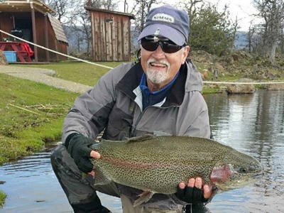 Ken with a huge rainbow