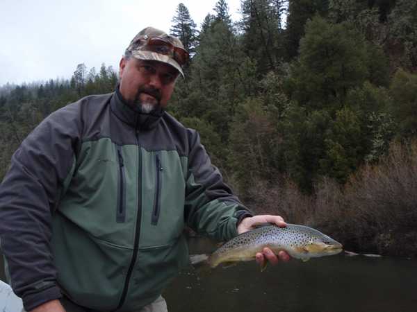 Mike Corley with a brown caught on a dry