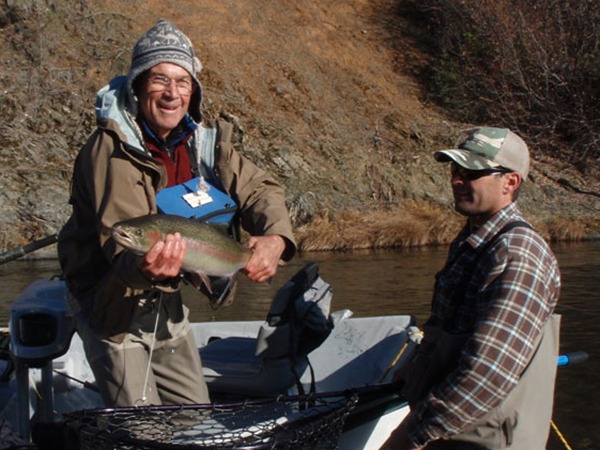 Jay and client Jim with a fish