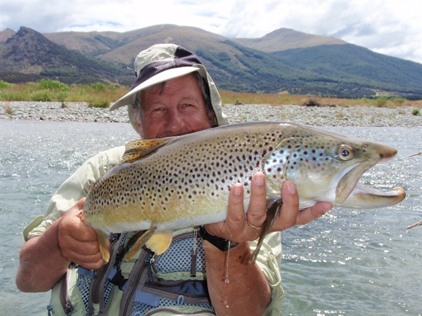 you can't see Fred behind this giant fish