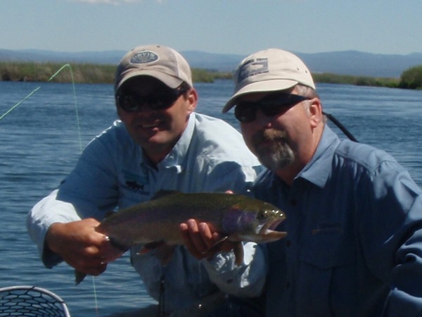 Jay and client Dave with a huge rainbow