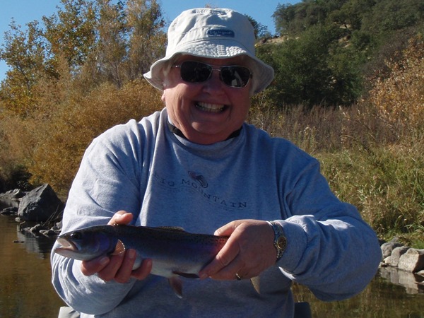 Cathy with a fish caught on a twitched nymph