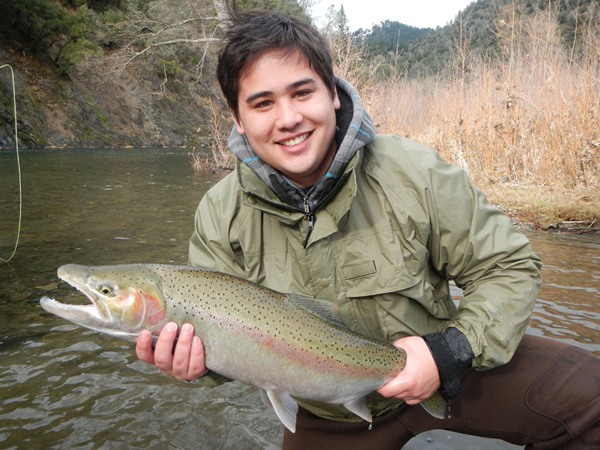 Jack with a great buck steelhead