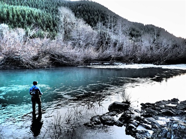 Doug swinging a perfect tailout on a remote river