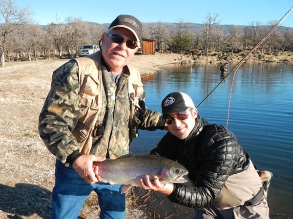 Sam helps Fred with a great fish