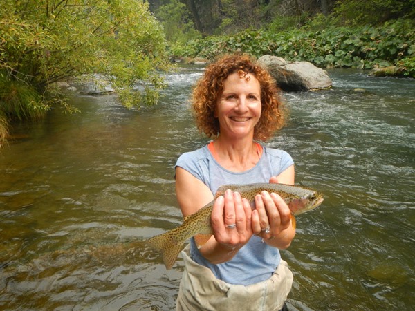 Gina with her big fish on her first cast