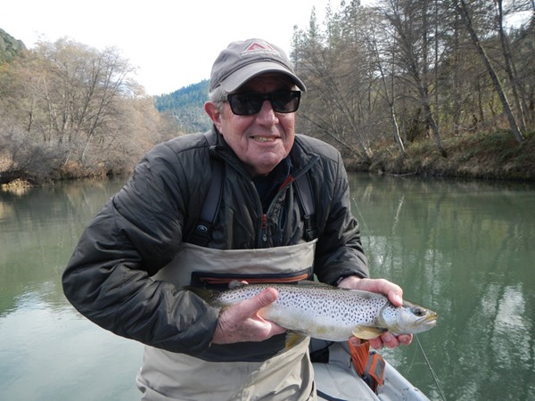 Mike with his big brown on a dry fly