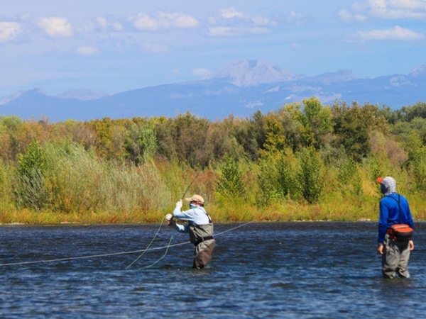 Patrick leans into a spey cast