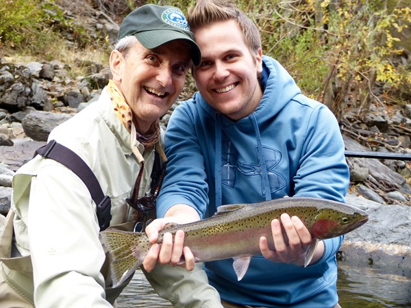 Father and son duo Ted and Zach with Zach's first steelhead. It was a wild one! 