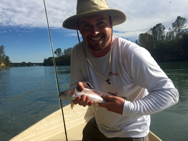 Colin with his first fish ever caught on a fly rod!  