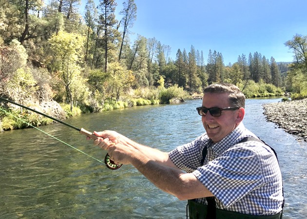 Brian w his first fish ever on a fly rod!