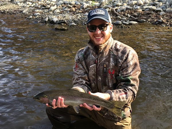 Austin with his first steelhead!