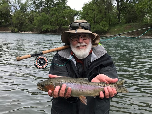 Chris with a beautiful fish caught on a 4wt trout spey rod!