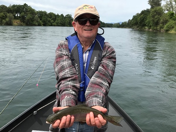 Bill with his first rainbow on a fly!