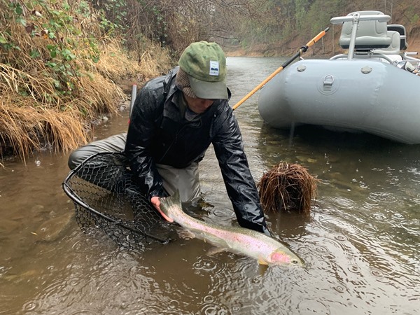 Andrew with a big Trinity steelhead