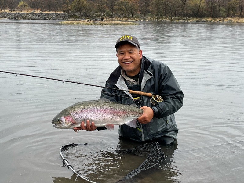 Tony fooled this nice trout on a dark colored streamer.