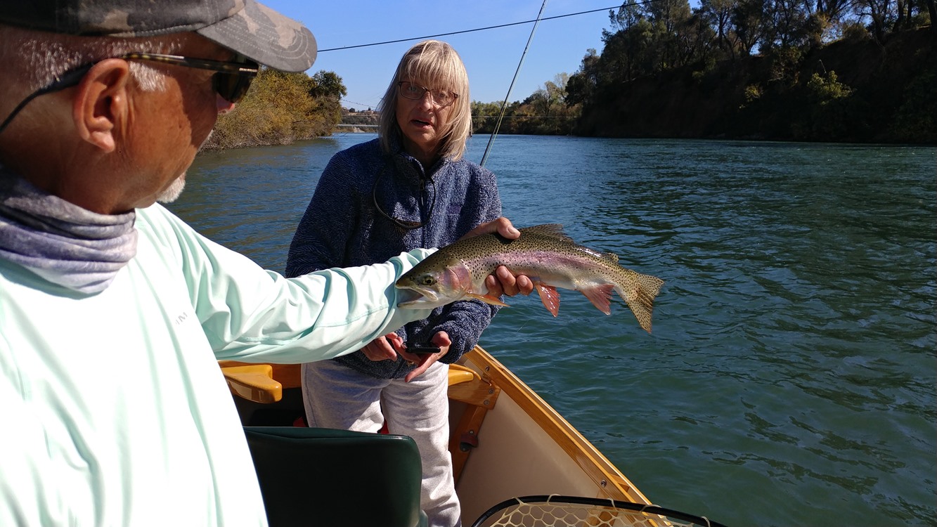 Judy and a fish that looked a little steelhead-ish