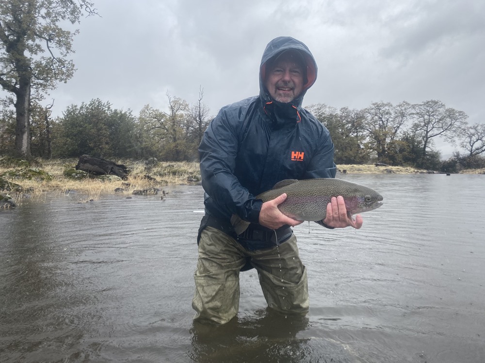 Jeff with a trout on the lower lake.