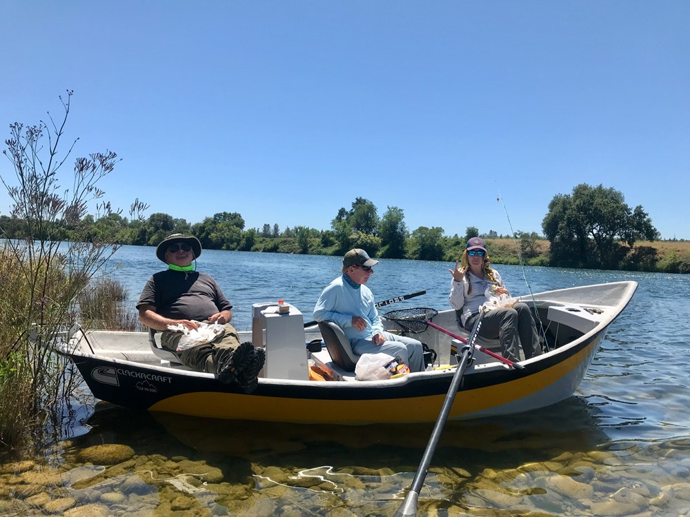 Fred, Peter, and Courtney doing lunch on the Big River