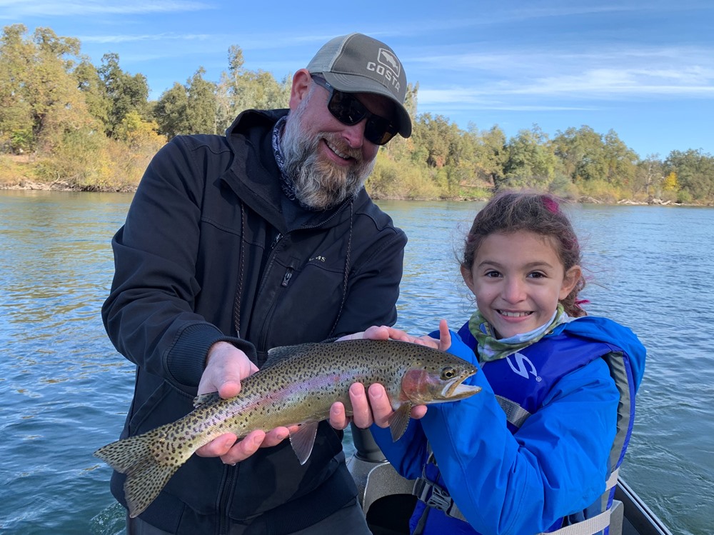 Mackenzie helping her dad