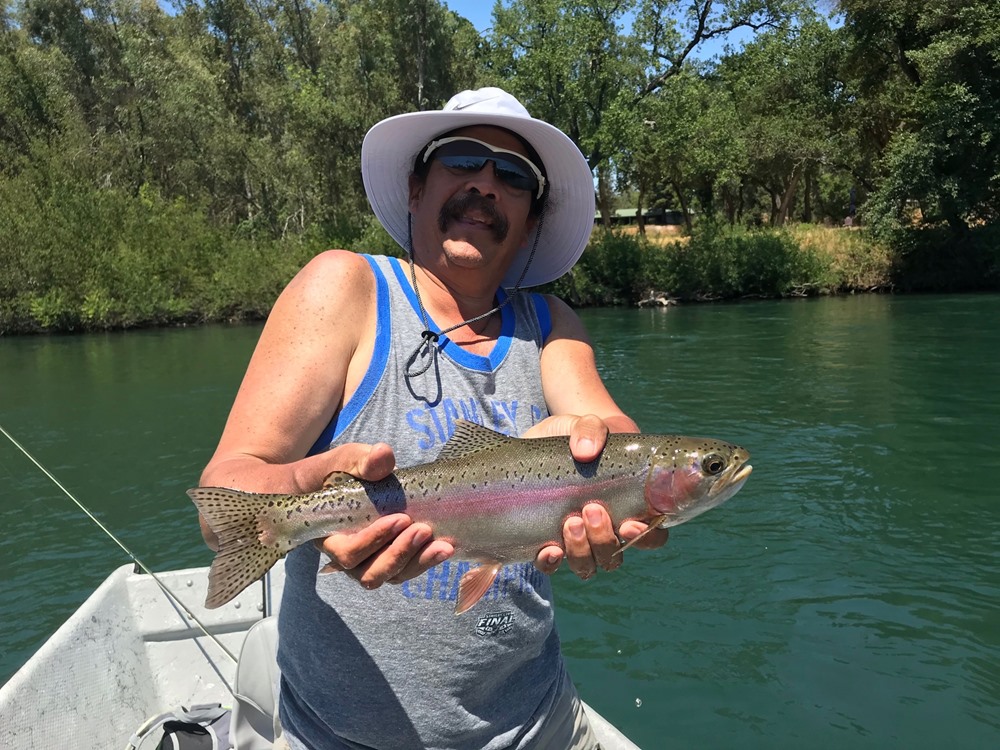 Pat with a nice wild Lower Sac rainbow