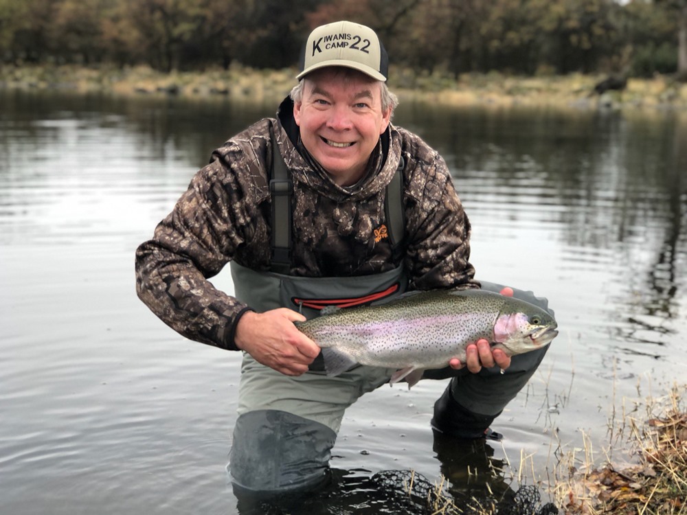 Alan with his first fish on the very first cast of the day.