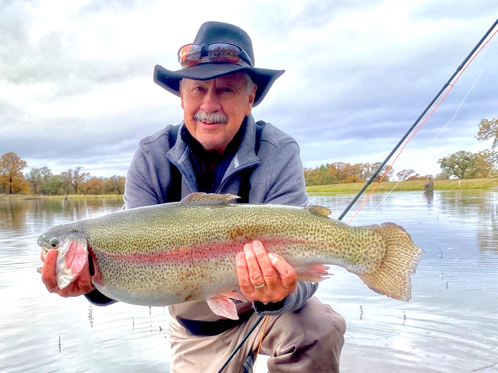 Newbie Malcolm with his first Eagle Canyon trout.