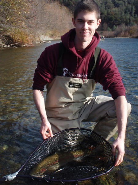 Alex with his first steelhead ever