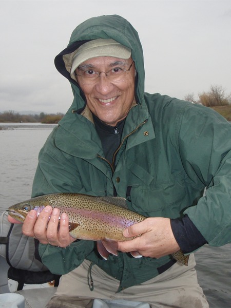 Tony with a colorful rainbow