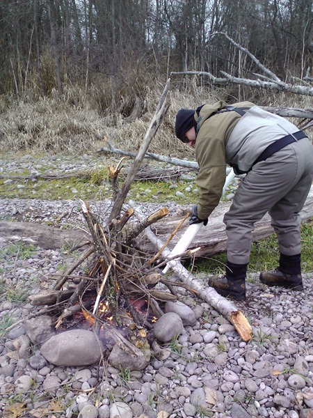 JR stoking fire with K Pump