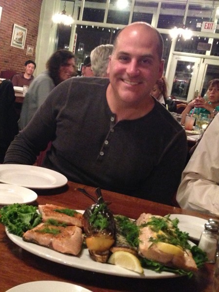 Chris with his catch prepared by La Grange in Weaverville