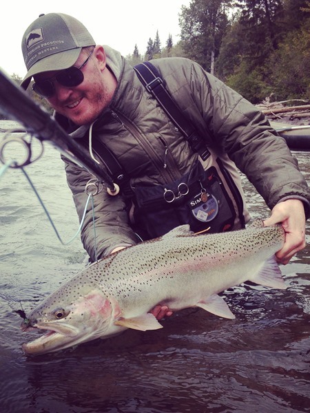 Darcy Bacha with a superb dry fly steelhead, he only fishes the dry fly.  epic