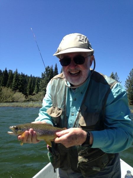 John with his first fish of the day