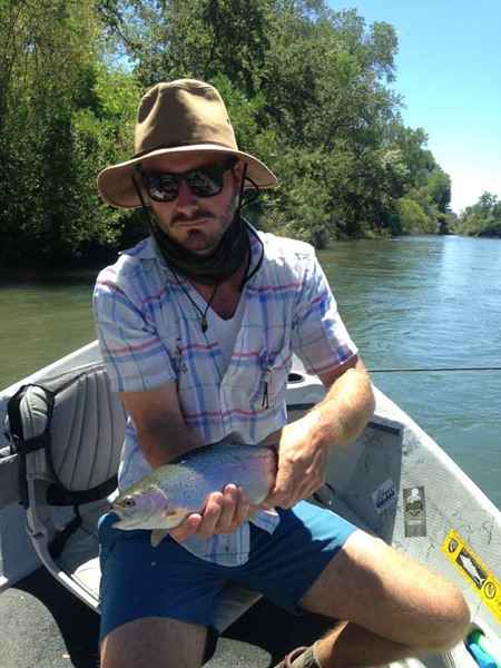 Drew with his first fish of the day