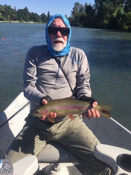 Dave with an 18 dandy.  Wind took his hat.  Small Sacrifice for the picture