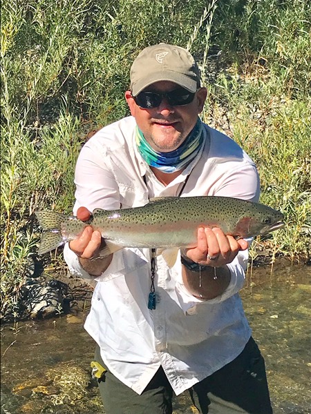 Mike with his first-ever steelhead