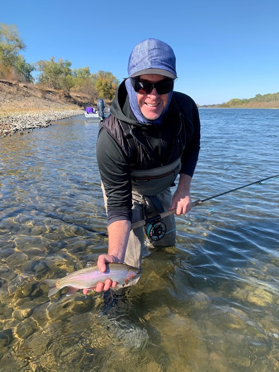 Erik with a feisty trout