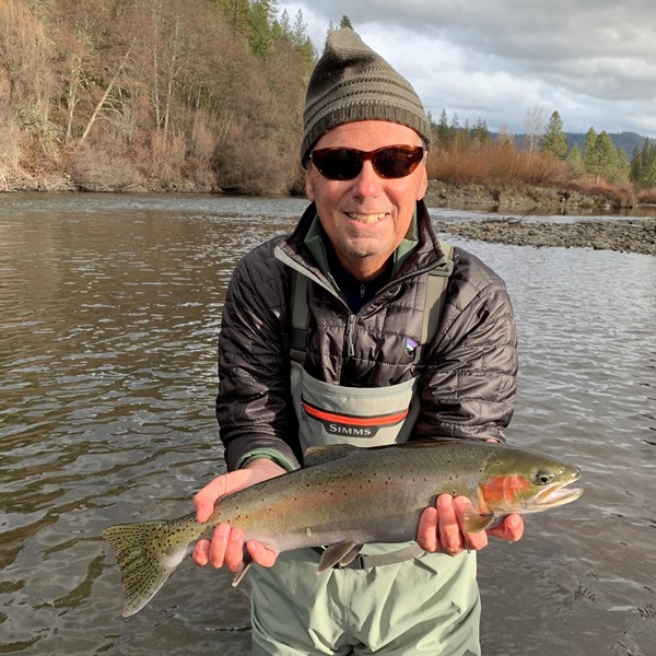 Geza with a beautiful steelhead!