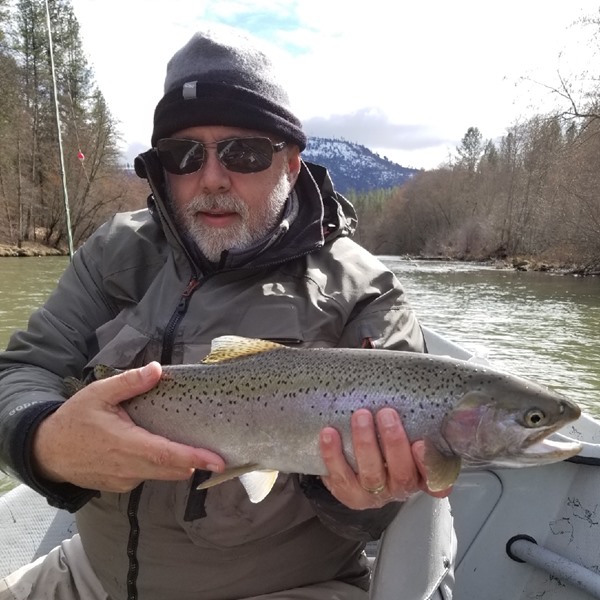 One of Peter's guests with a Trinity steelhead