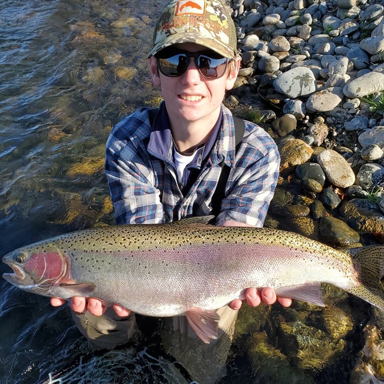 Ryan with his biggest fly rod fish to date