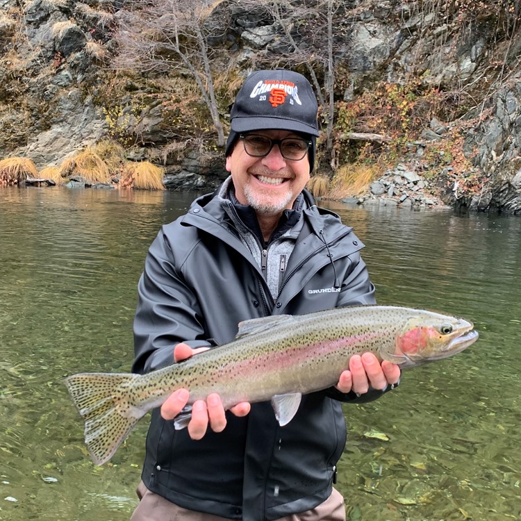 Lowell with his first steelhead ever!